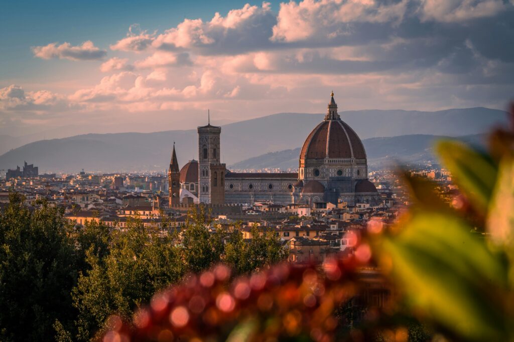 Scenic view of Florence's iconic cathedral at sunset, highlighting its architectural beauty and cityscape.